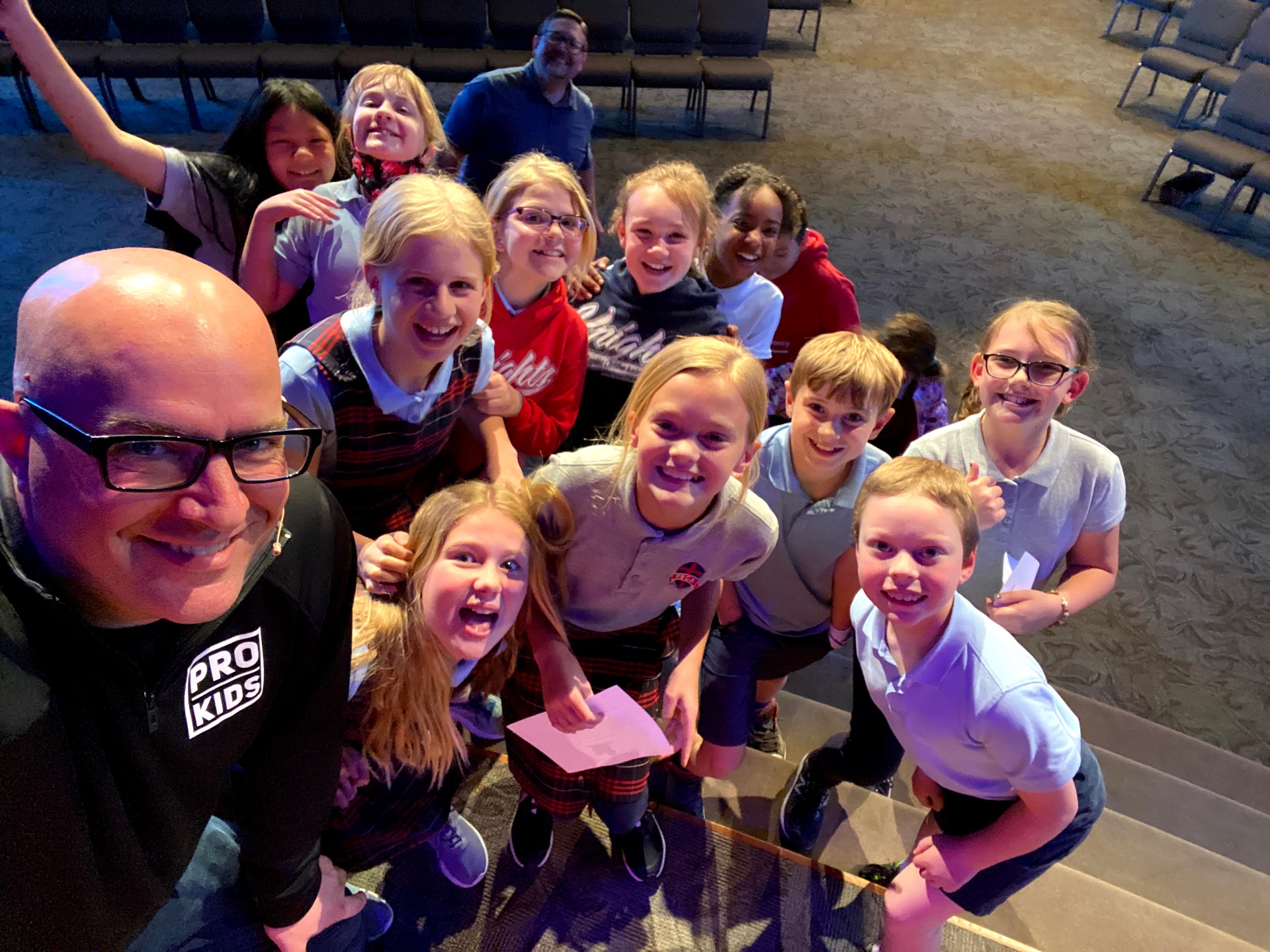 Tim with a group of Catholic school students after the show