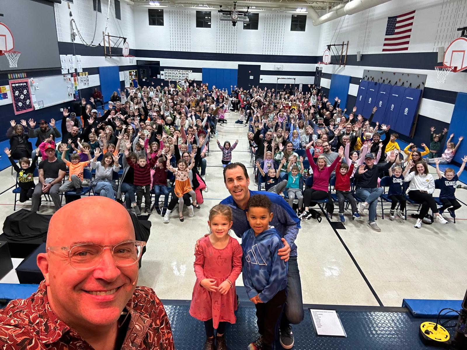 Principal selfie with Family Night crowd