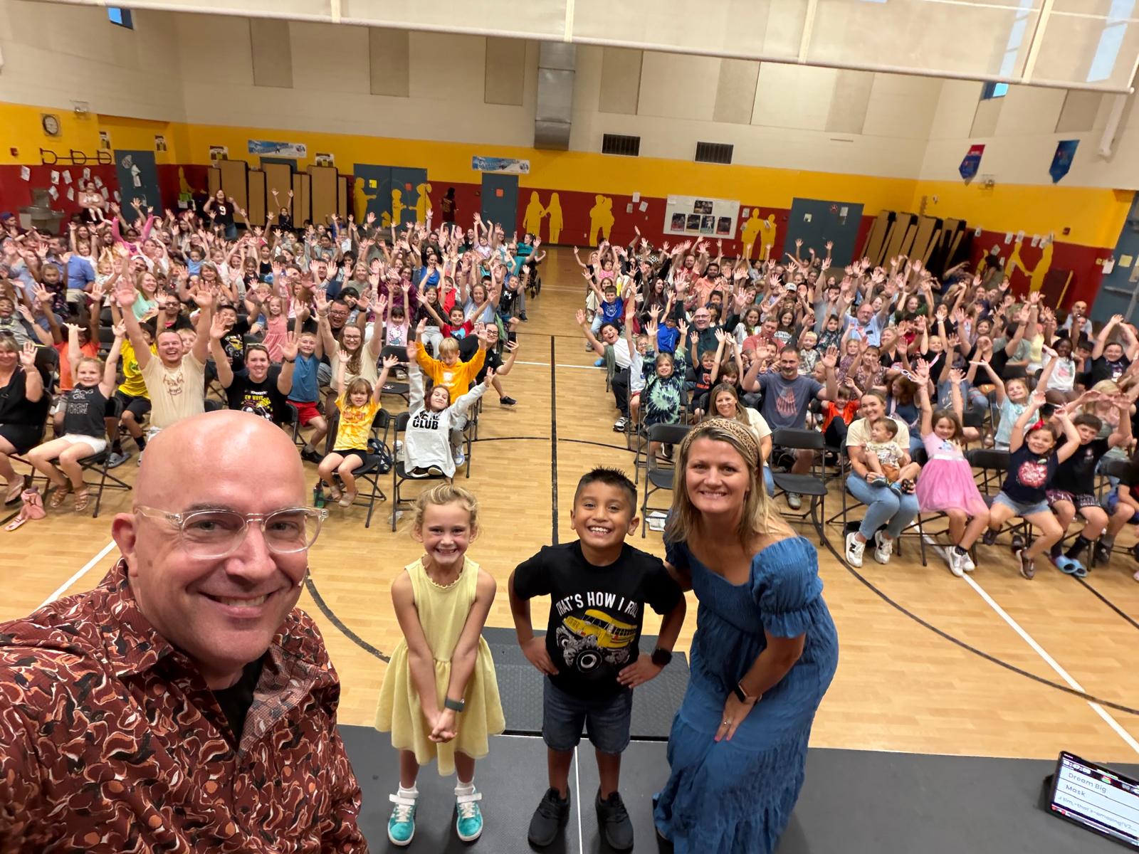 Principal selfie with Family Night crowd
