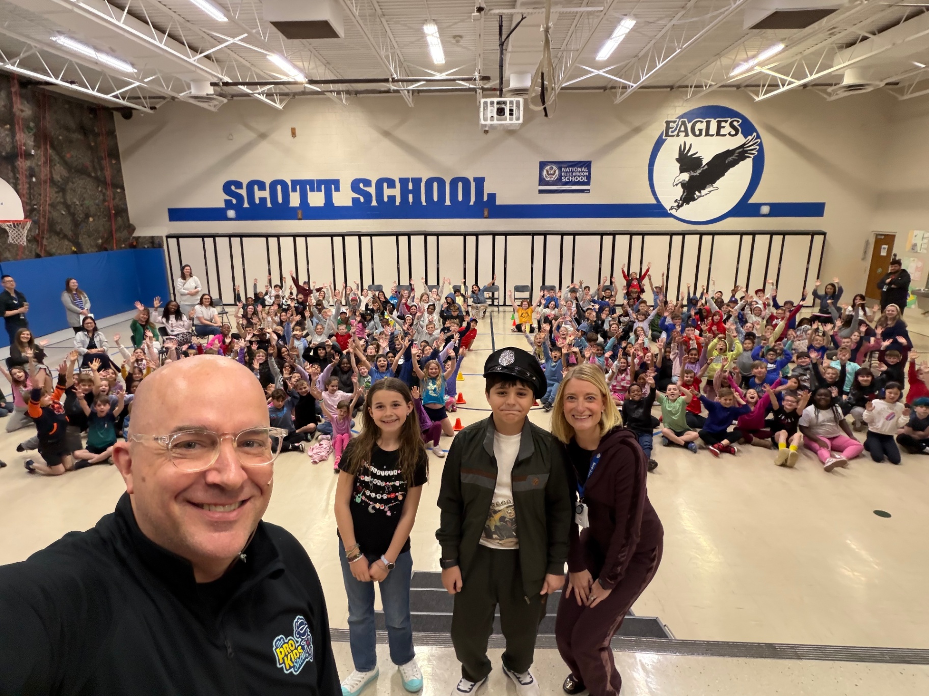 Students and staff after a Pro-Kids Show assembly at Scott Elementary