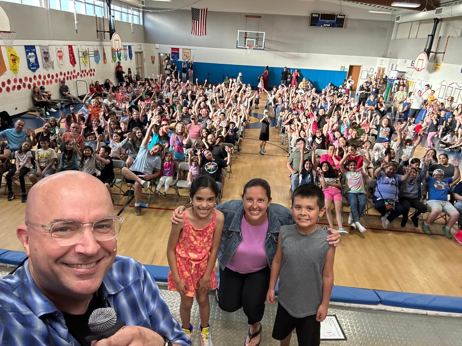Principal selfie with Family Night crowd