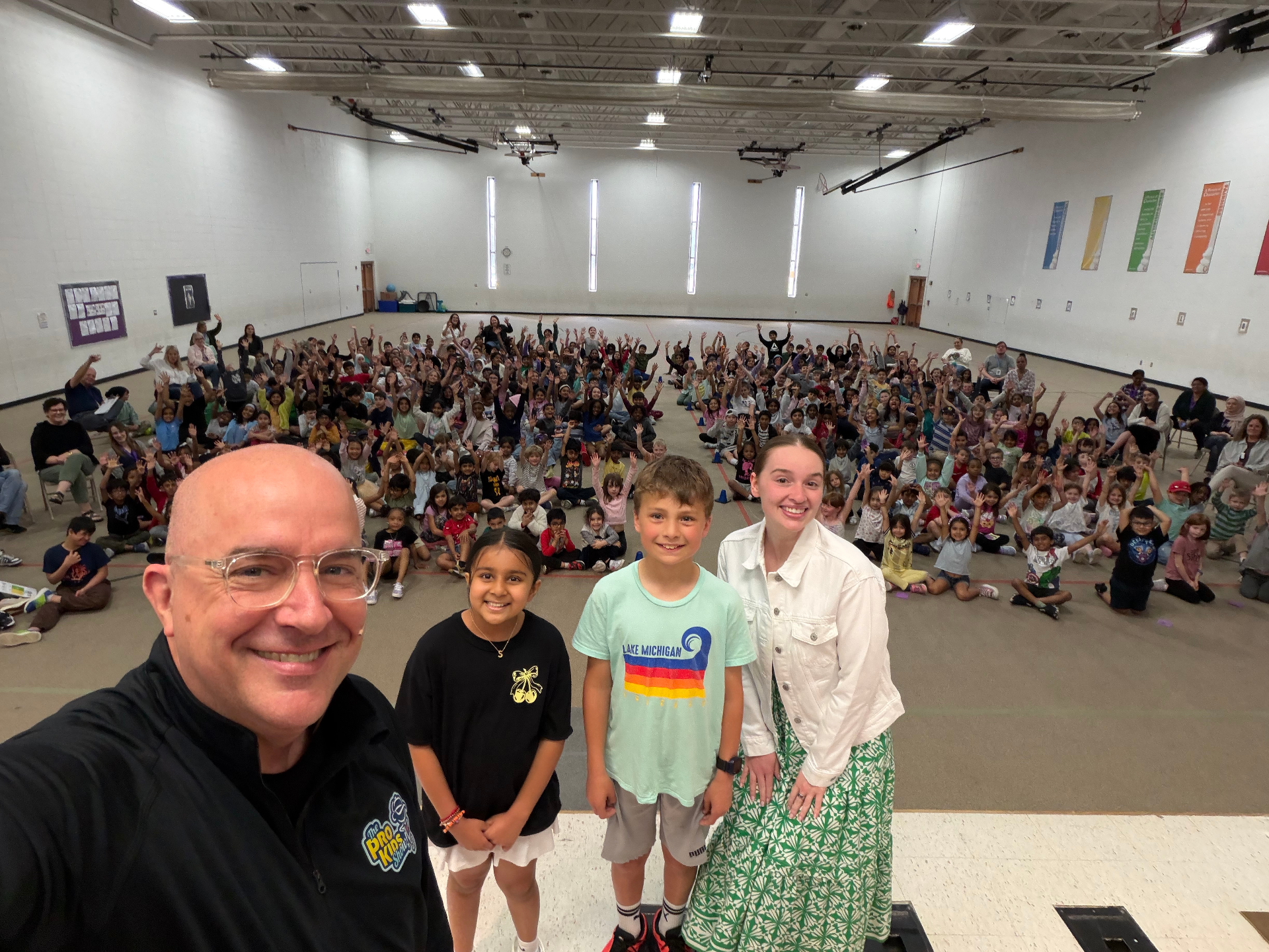 Students and staff gathered after a Pro-Kids Show assembly at Owen Elementary