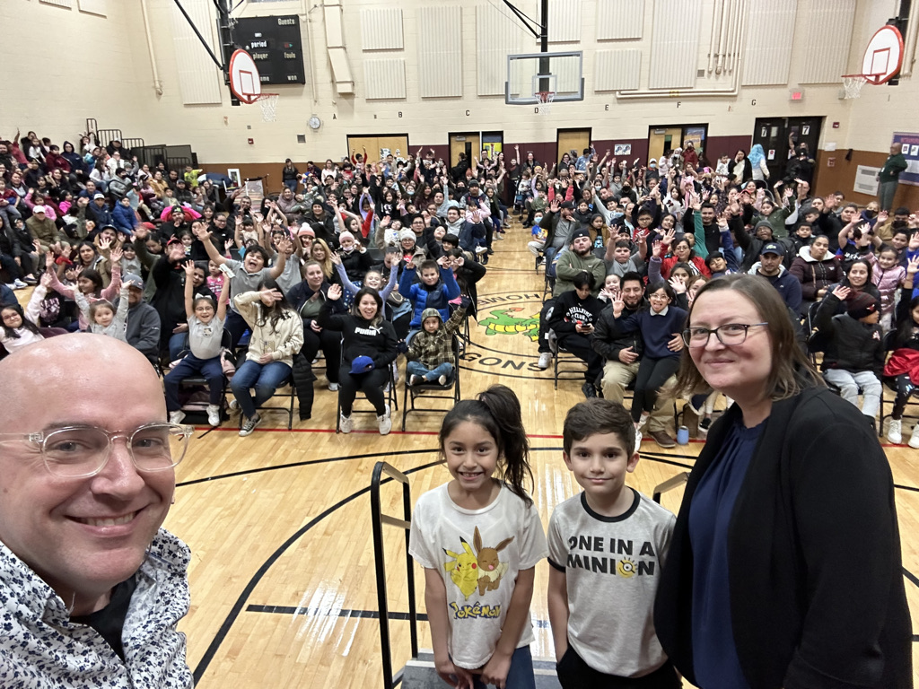 Principal selfie with Family Night crowd