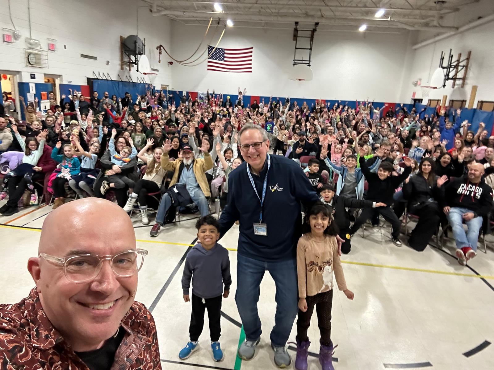 Principal selfie with Family Night crowd