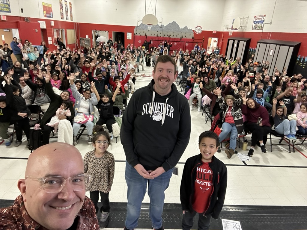 Principal selfie with Family Night crowd