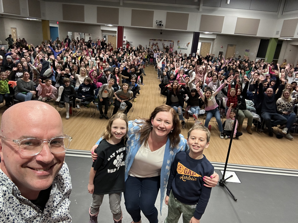 Principal selfie with Family Night crowd
