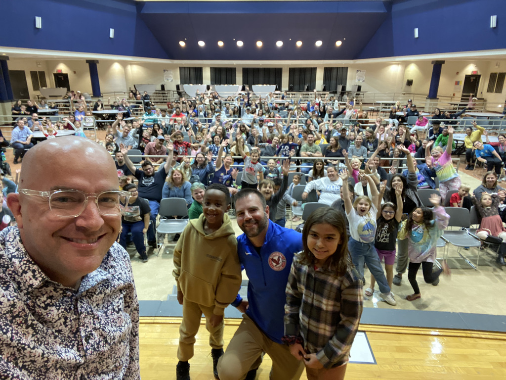 Principal selfie with Family Night crowd
