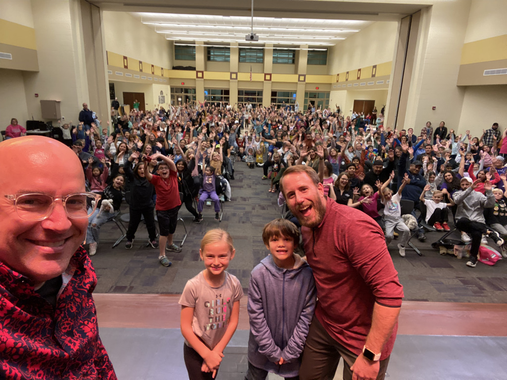 Principal selfie with Family Night crowd