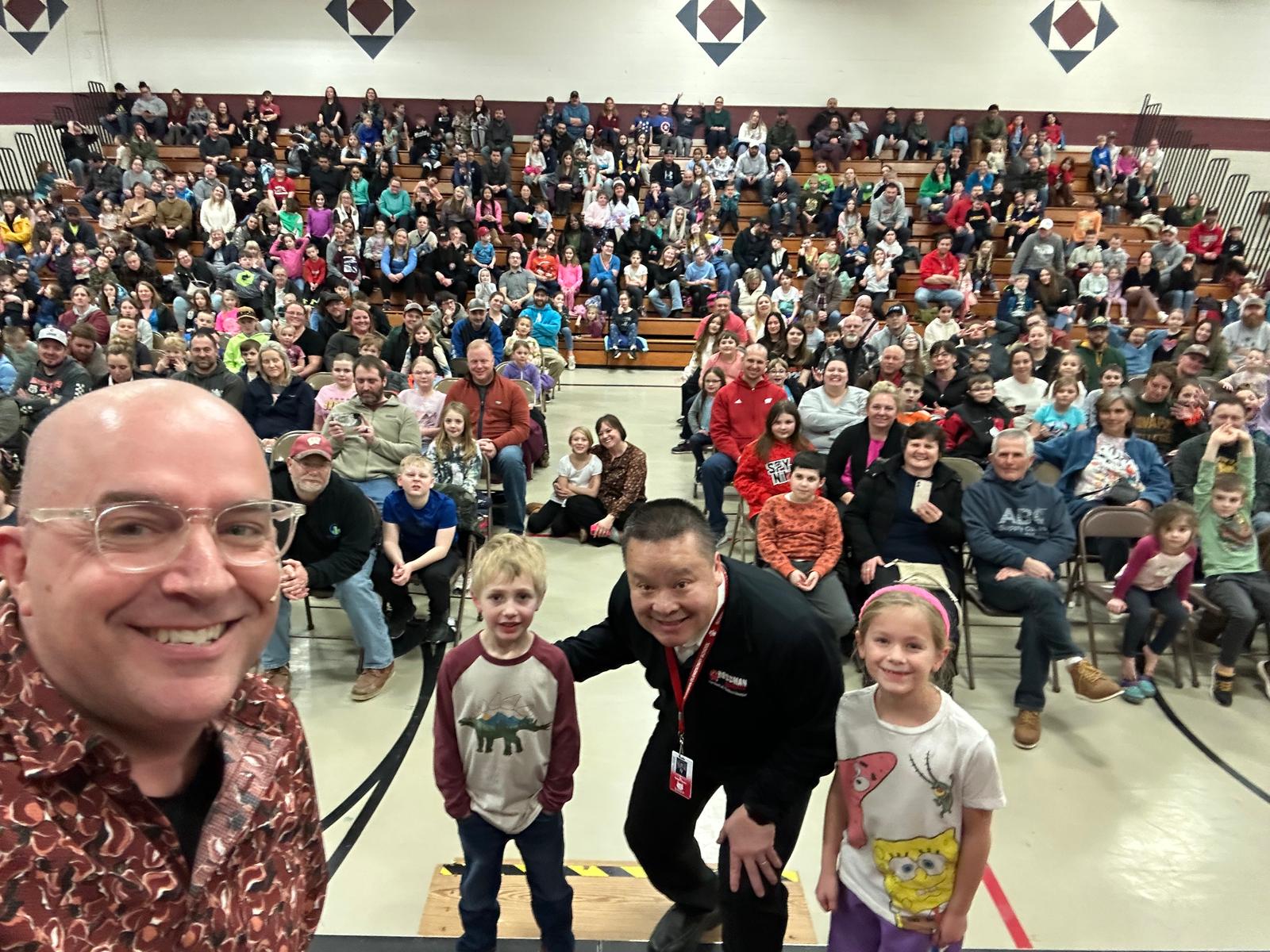 Principal selfie with Family Night crowd