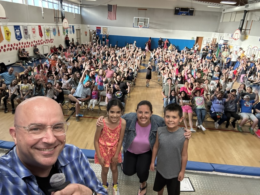 Principal selfie with Family Night crowd