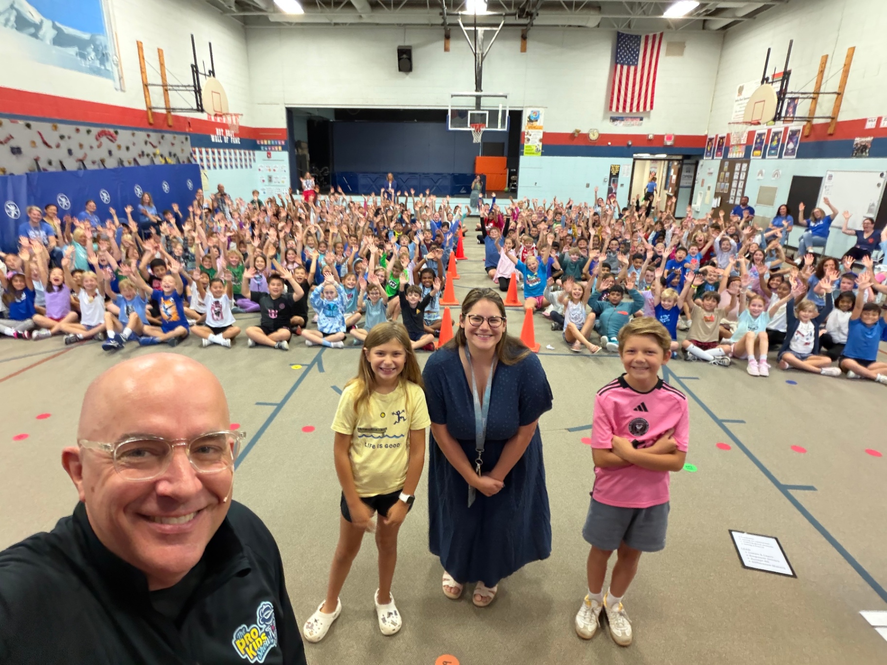 Students and staff after a Pro-Kids Show assembly at Springbrook Elementary