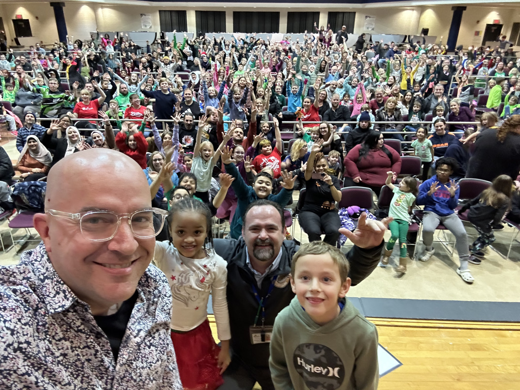 Principal selfie with Family Night crowd