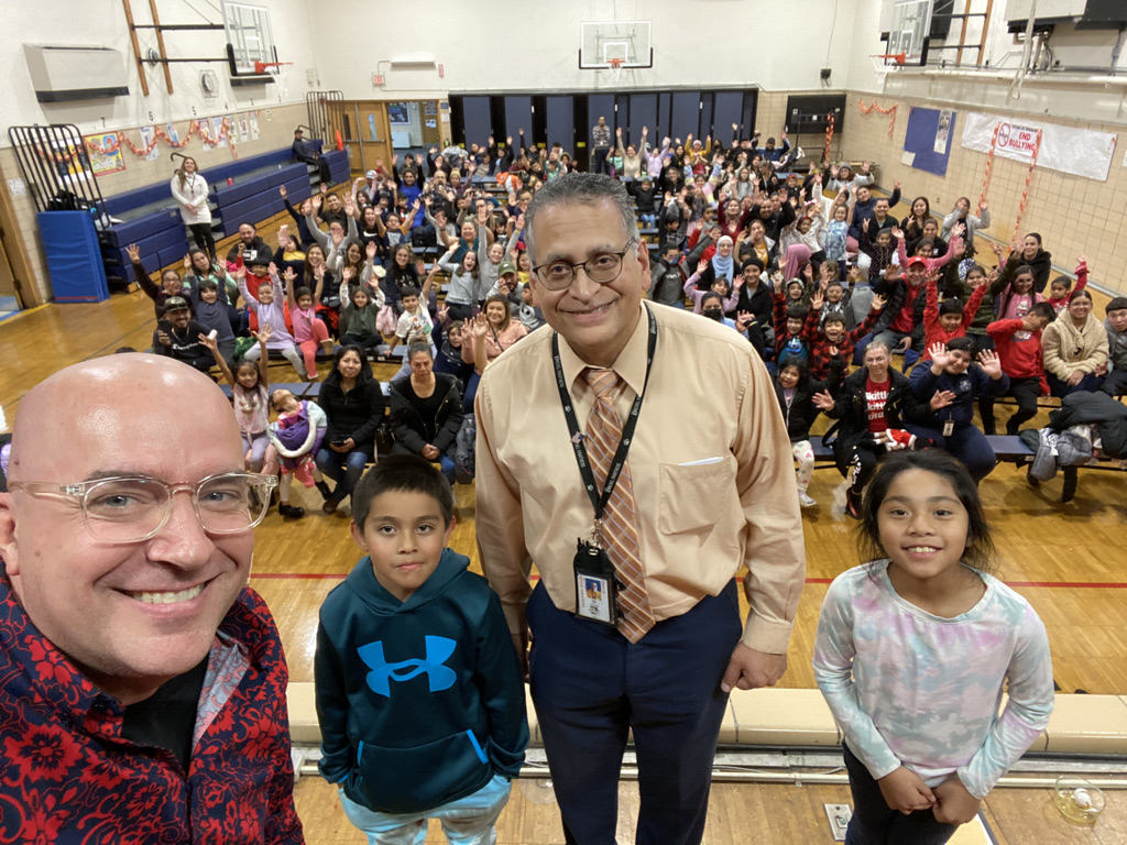 Principal selfie with Family Night crowd