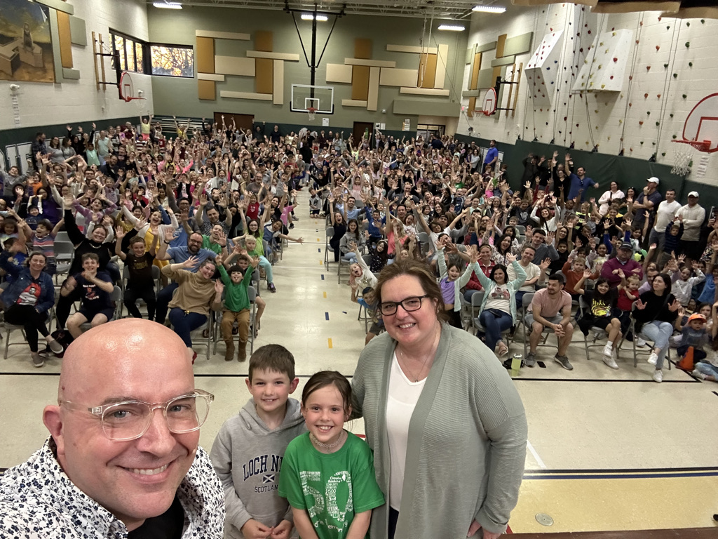 Principal selfie with Family Night crowd