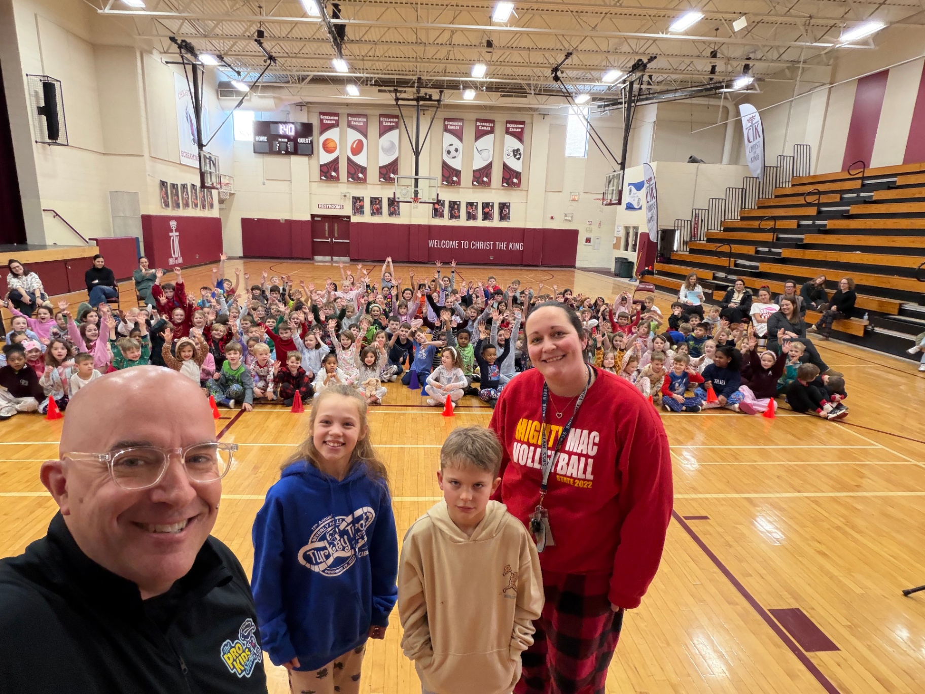 Chicago Catholic school assembly, a repeat host