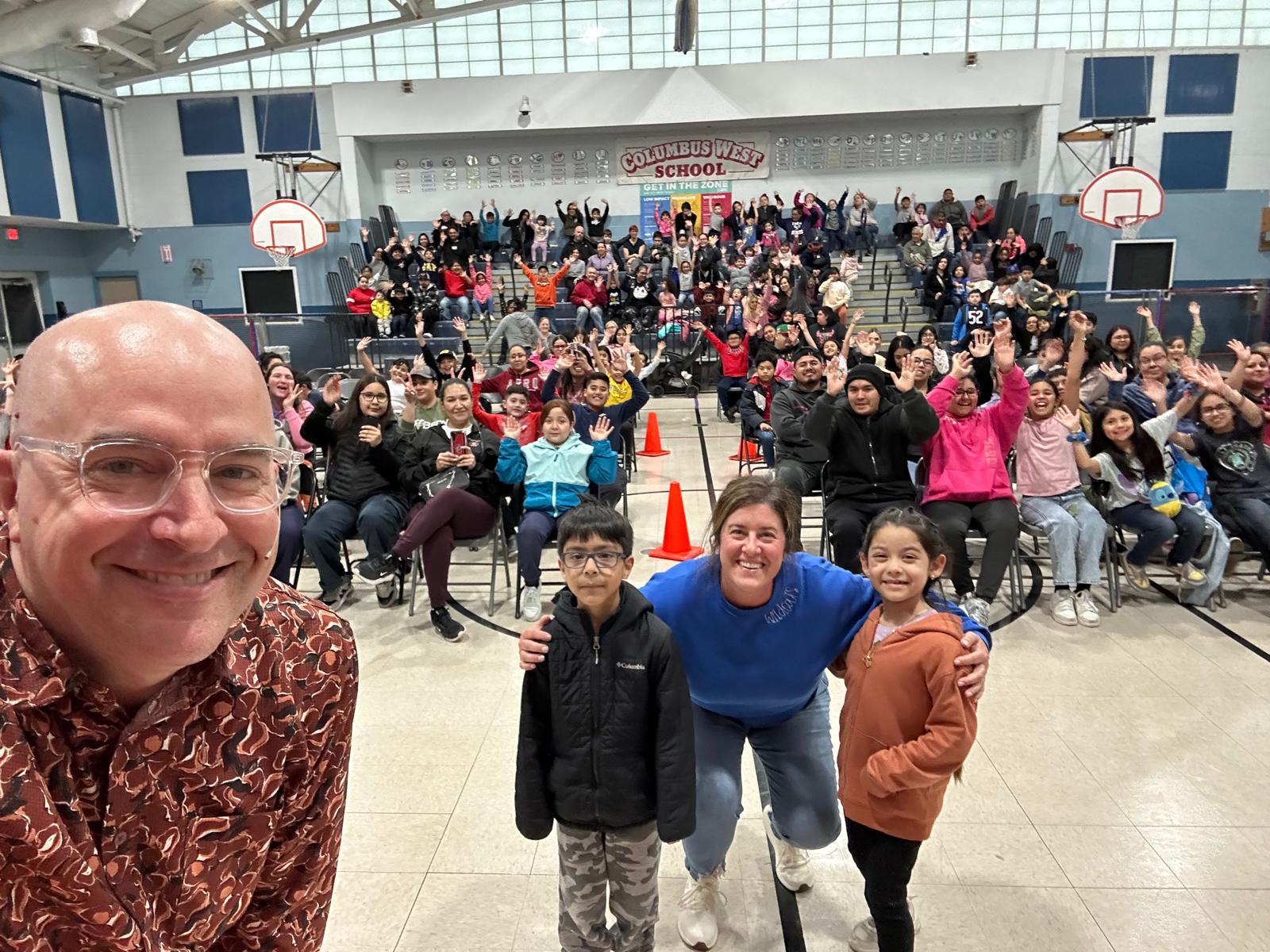 Principal selfie with Family Night crowd