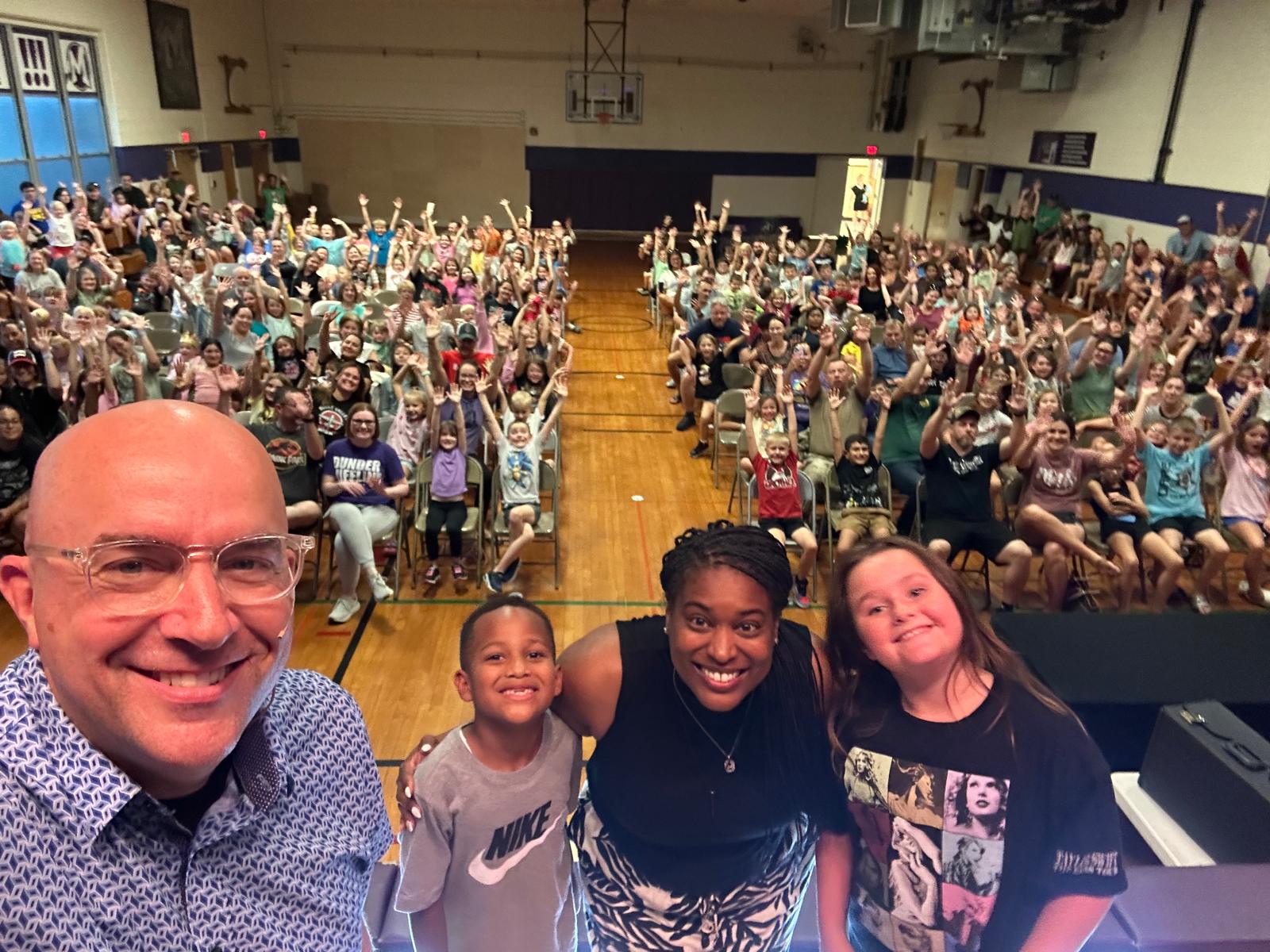 Principal selfie with Family Night crowd