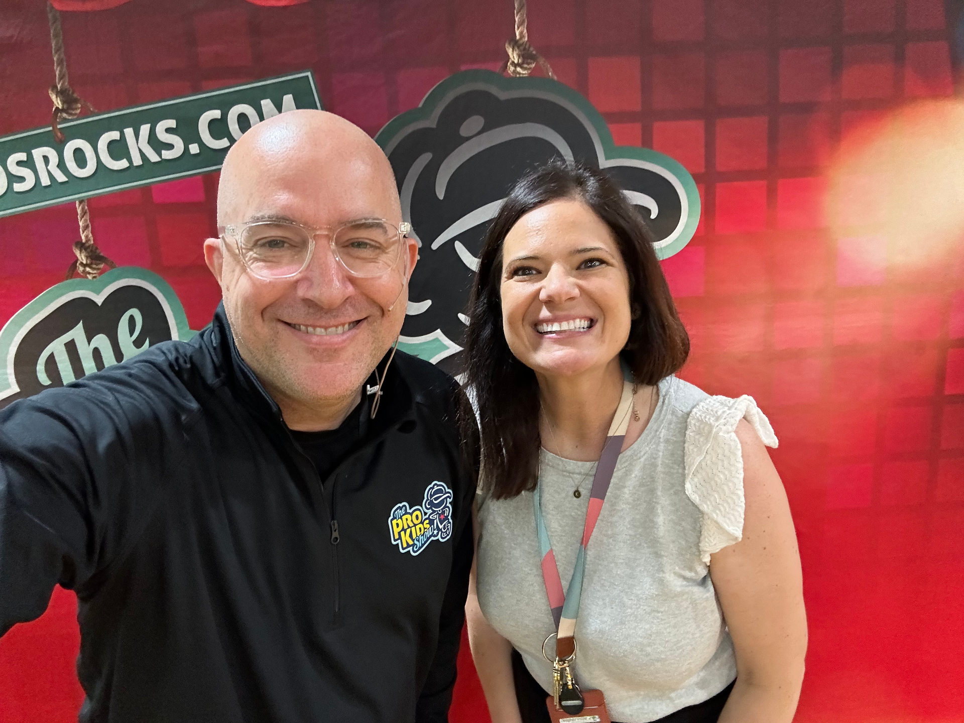 Tim with a staff member after a Pro-Kids Show visit to Ellsworth Elementary