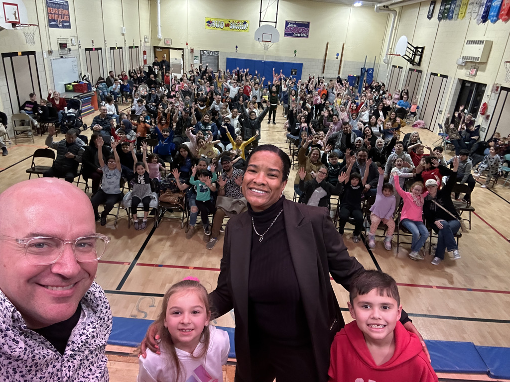Principal selfie with Family Night crowd