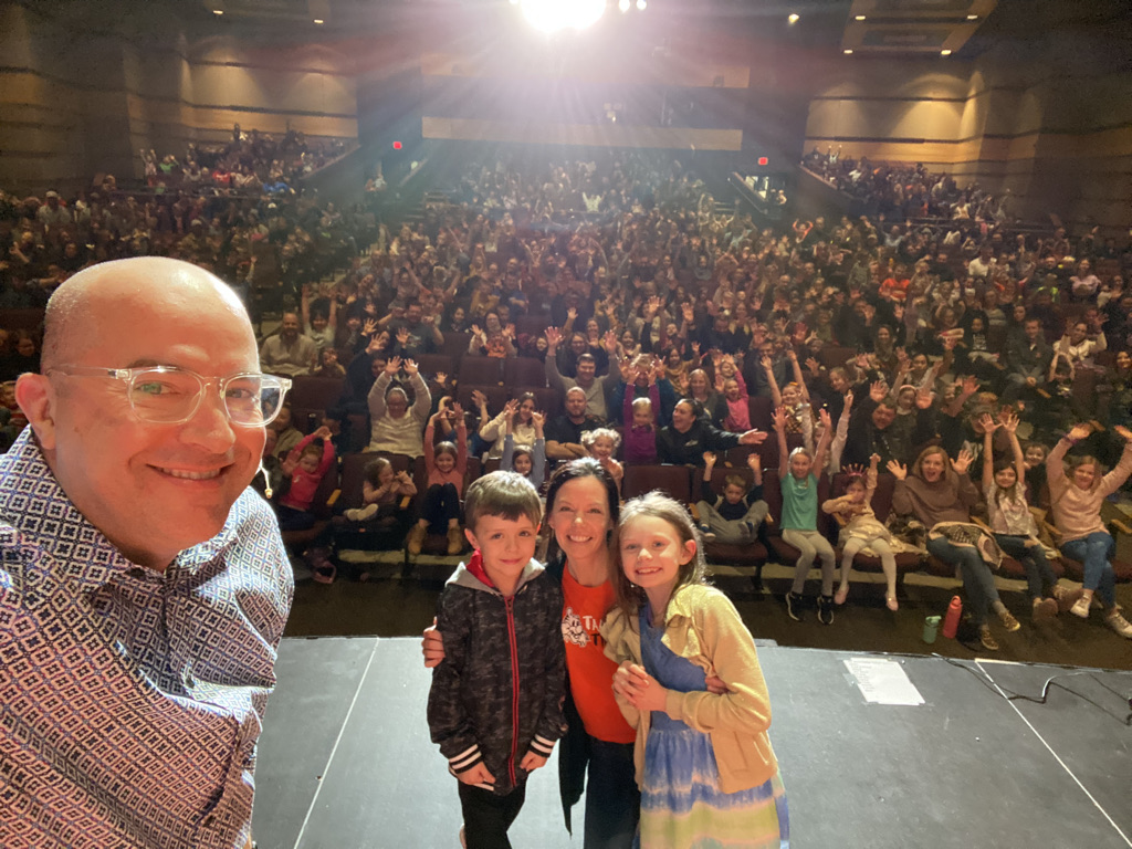 Principal selfie with Family Night crowd