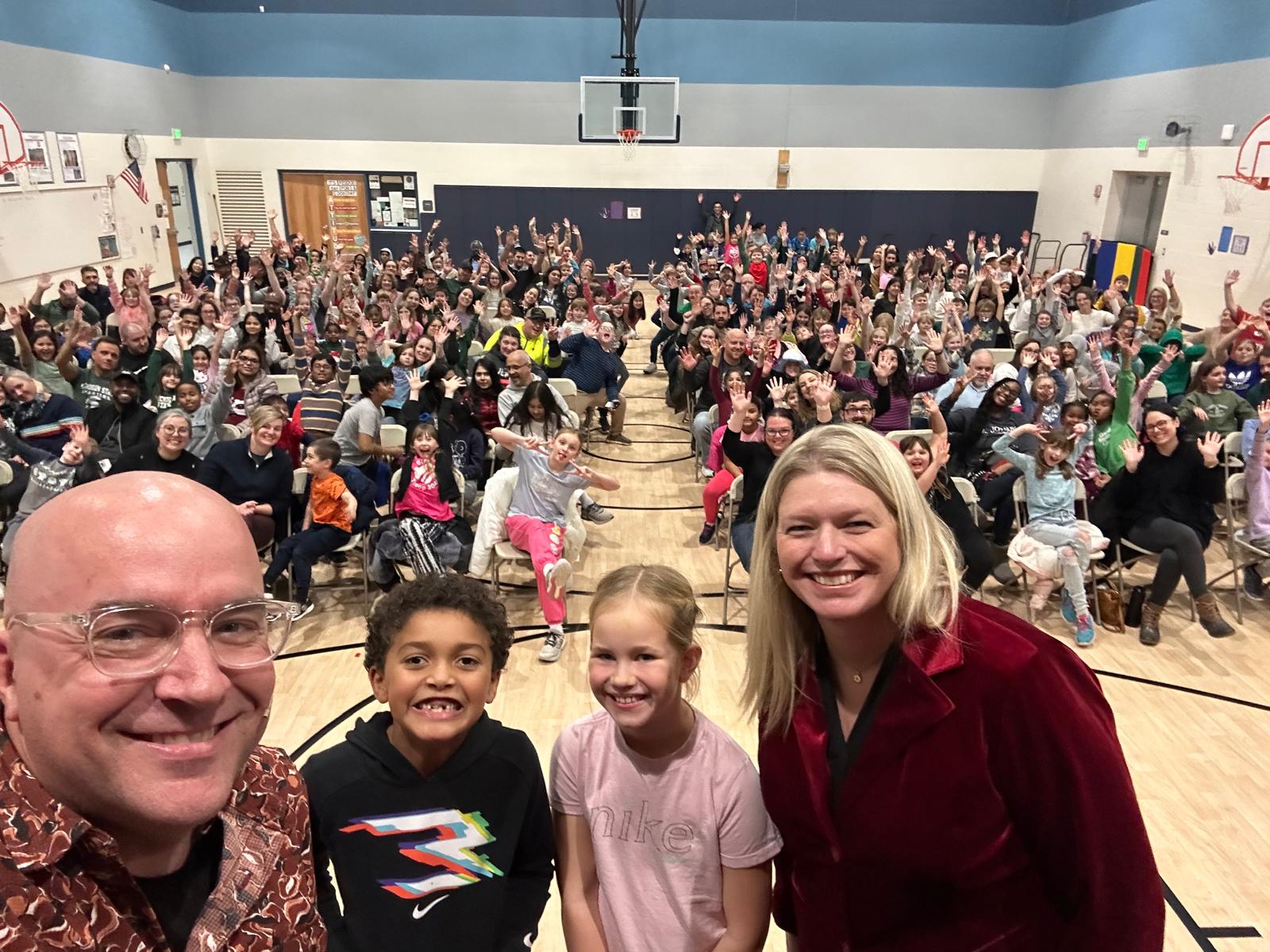 Principal selfie with Family Night crowd