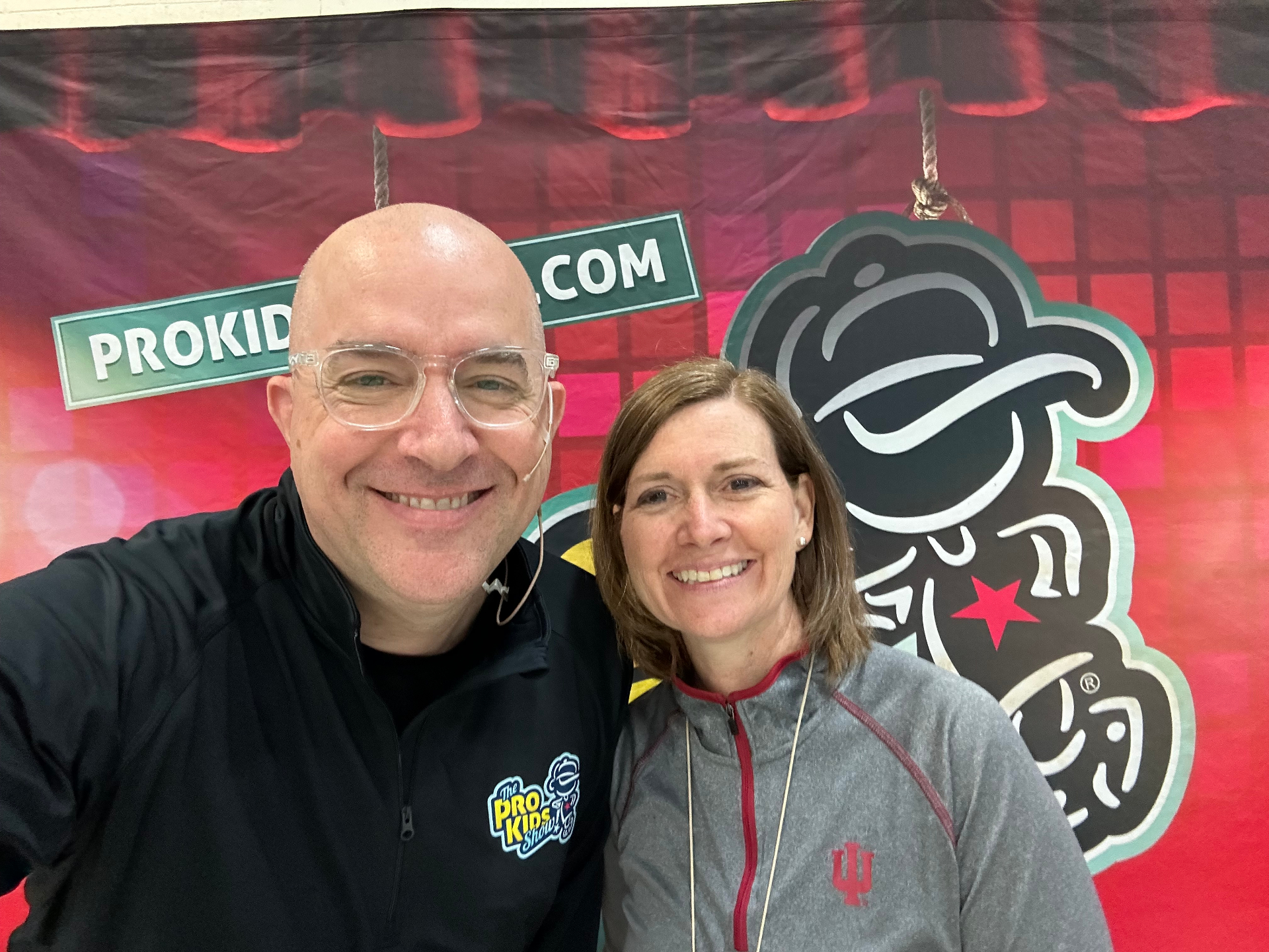 Tim with a staff member after a Pro-Kids Show visit to Ranch View Elementary