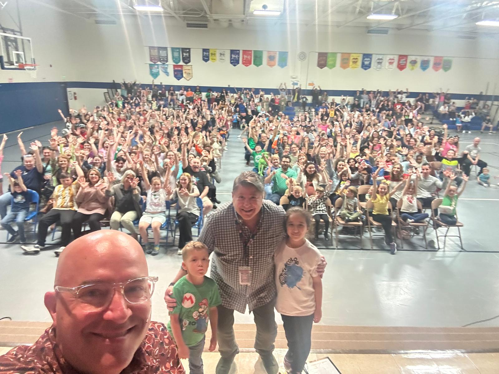 Principal selfie with Family Night crowd