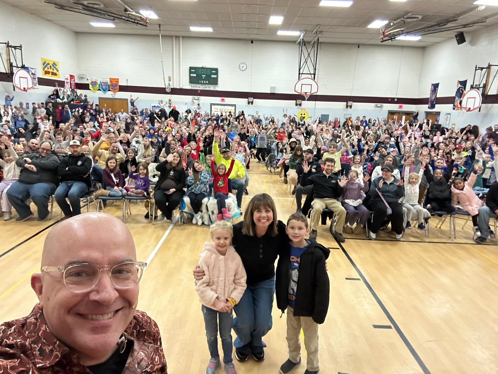 Principal selfie with Family Night crowd